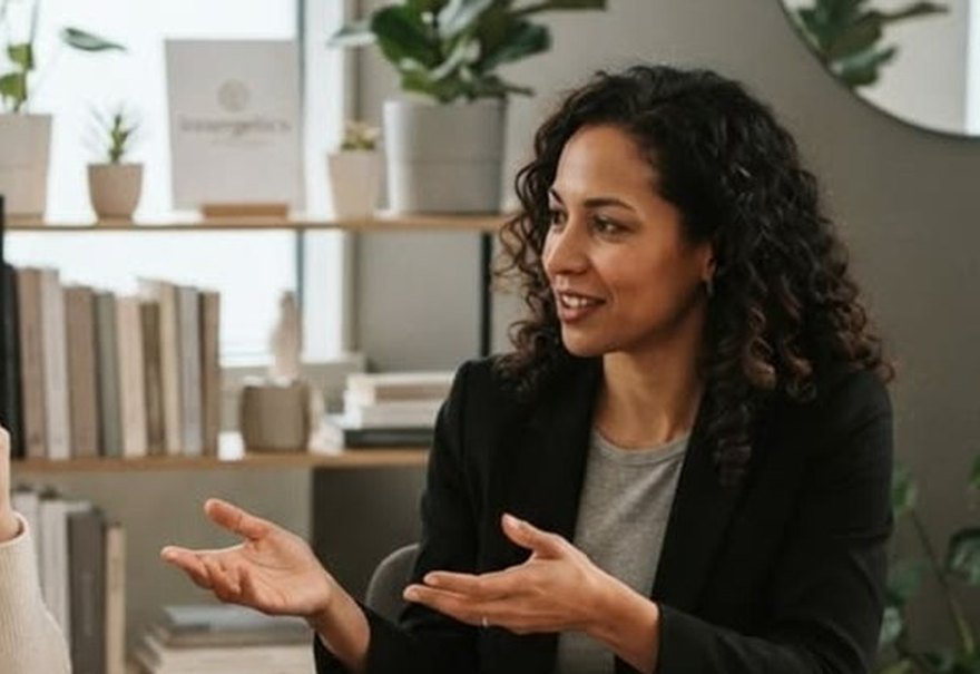 Advisor explaining options to a borrower — what is Lending Buddy